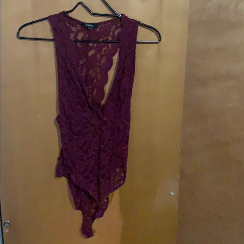 Laced body suit